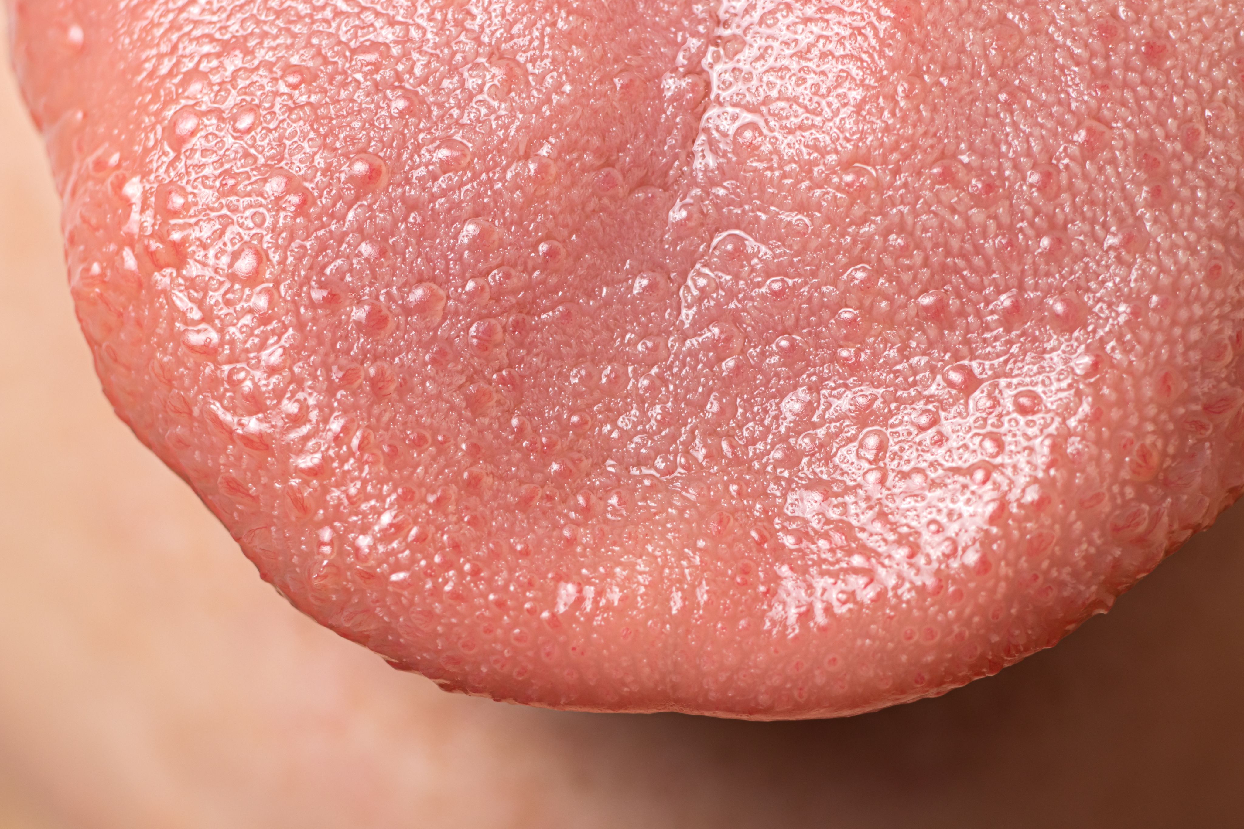 A close-up of a human tongue