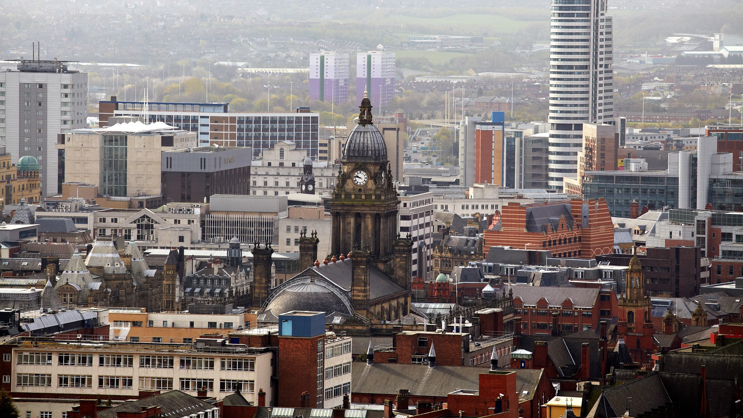 Aerial view of the city of Leeds with the clock tower in the centre