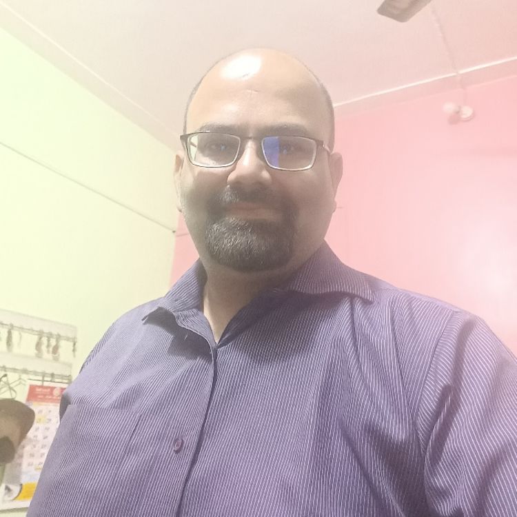 Photo of Rohit Pradhan wearing a purple shirt