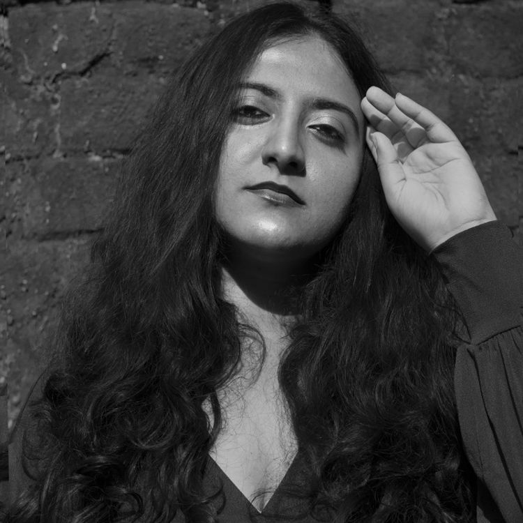 Black and white profile photo of Dhruti Trivedi