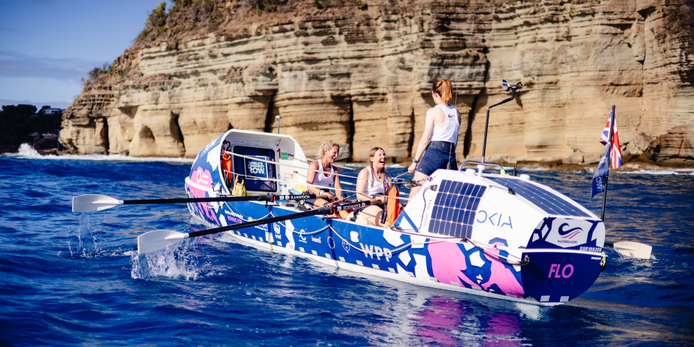 Team row towards the finish of the World's Toughest Row