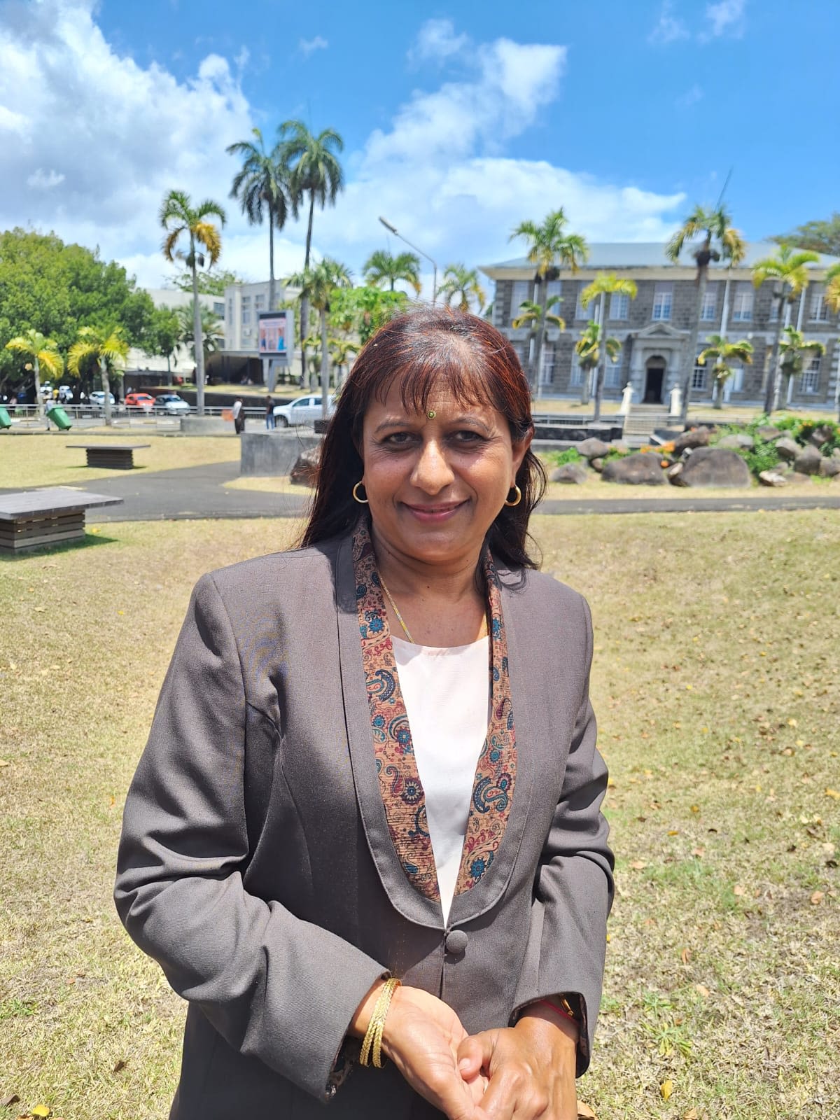 woman standing outside looking at the camera