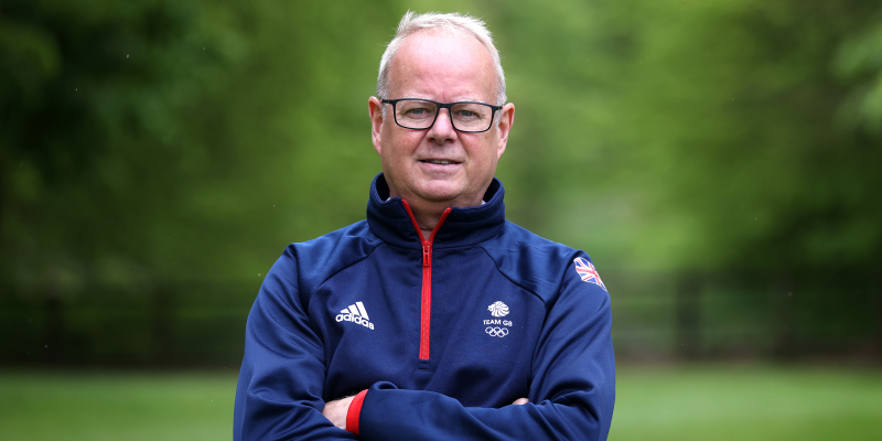 Mark England stands in GB tracksuit