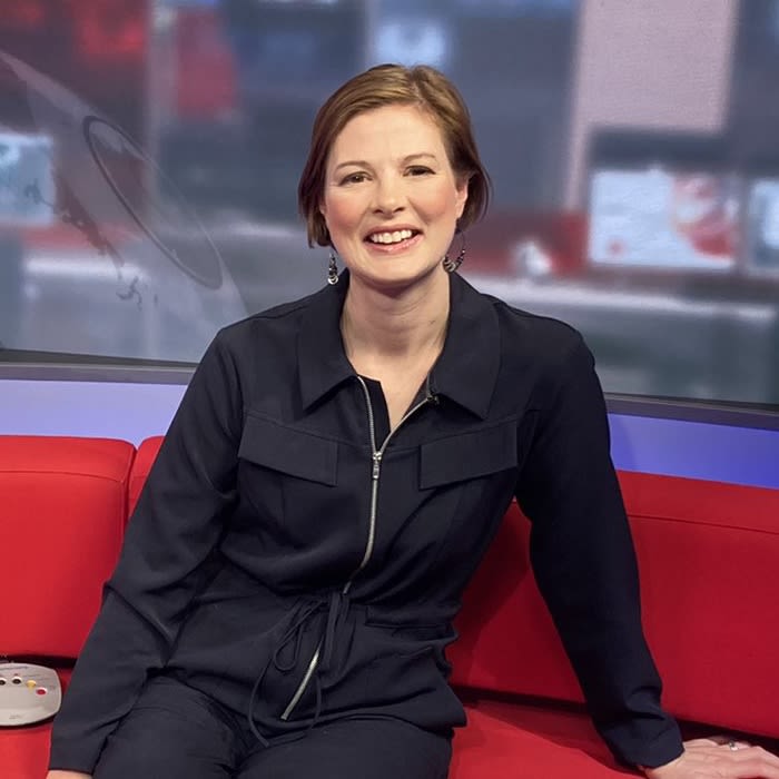 Sally Hurst sits upon the BBC Breakfast sofa for profile shot