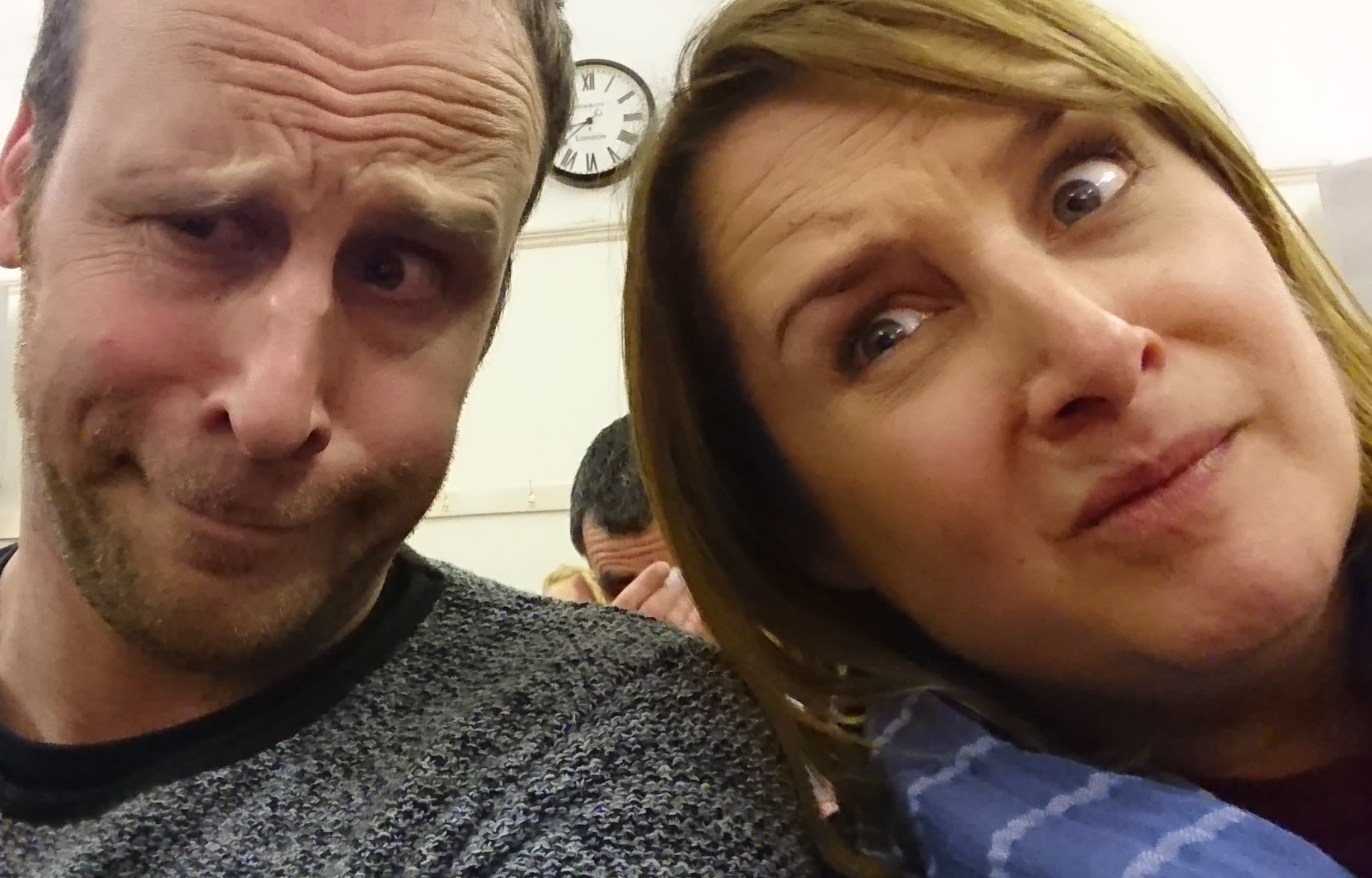 A couple pulling faces for a selfie photo