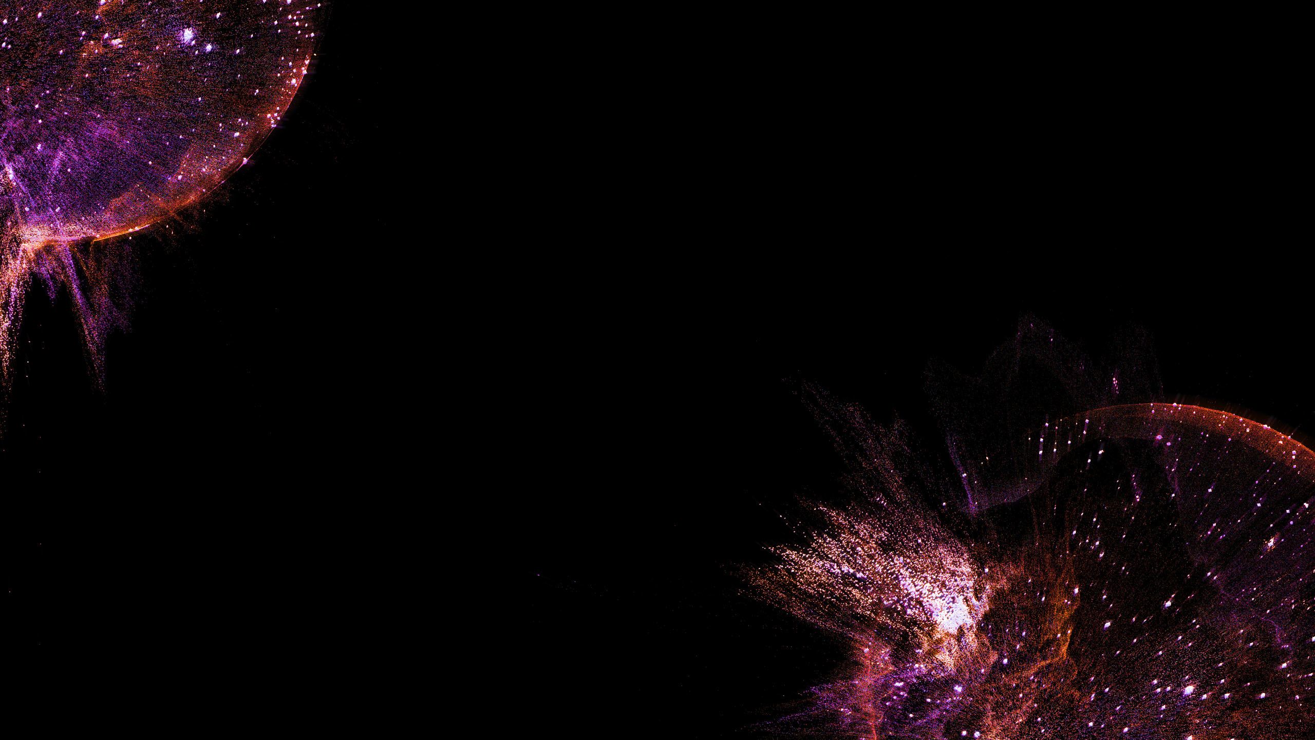 Orange and purple splashes on a black backdrop